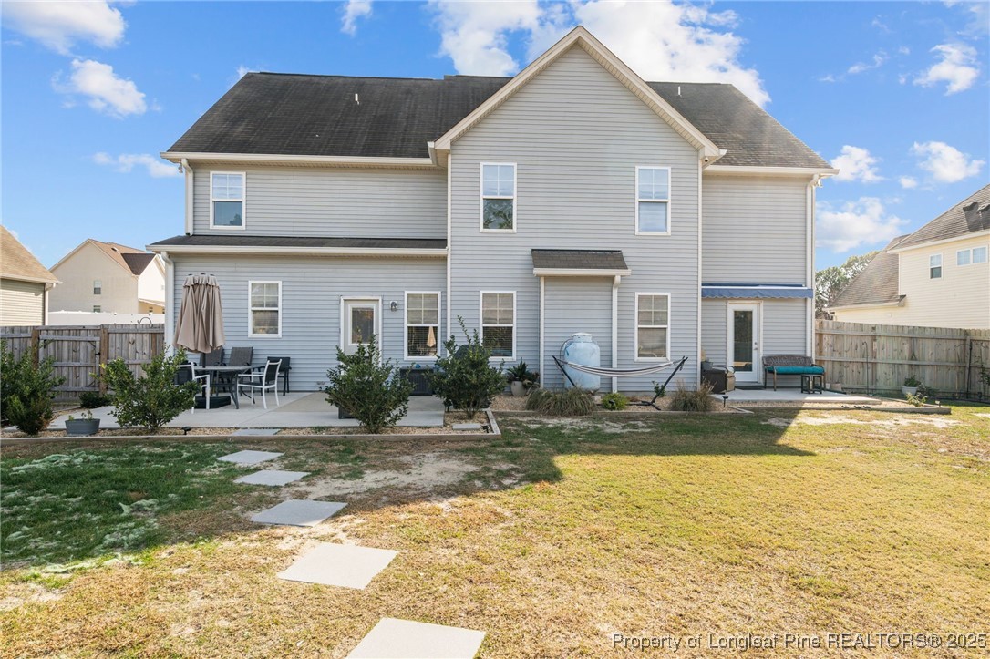 240 Heathrow Drive Spring Lake, NC 28390 - Photo 45 of 47 a view of a house with swimming pool and sitting area