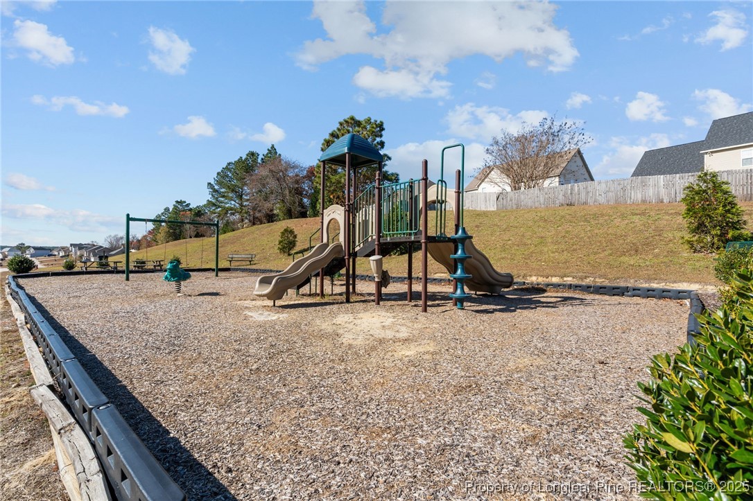 240 Heathrow Drive Spring Lake, NC 28390 - Photo 47 of 47 a view of a park with swings