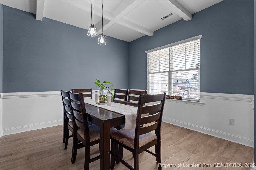 240 Heathrow Drive Spring Lake, NC 28390 - Photo 6 of 47 a view of a dining room with furniture and window