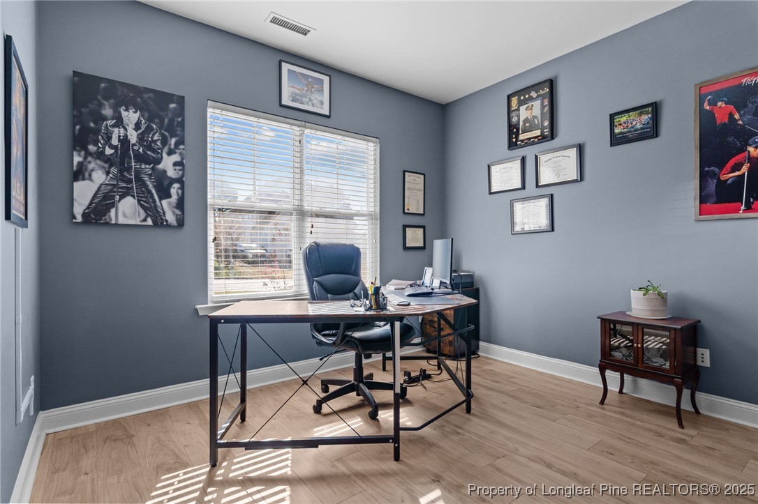 240 Heathrow Drive Spring Lake, NC 28390 - Photo 8 of 47 a workspace with furniture and window