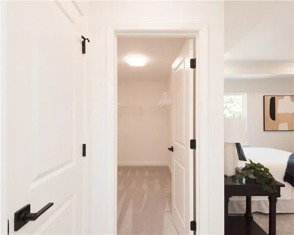 a bathroom with double vanity sink and a mirror