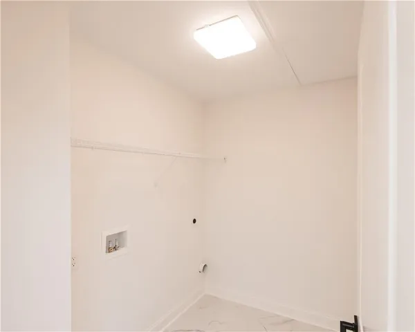 a bedroom with a bed and the wall painting