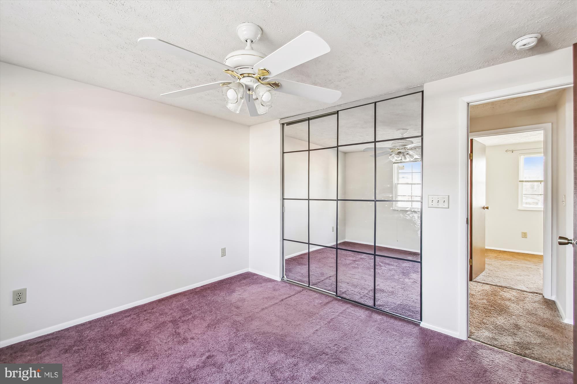 1474 Gesna Drive Hanover, MD 21076 - Photo 25 of 39 an empty room with fan and windows