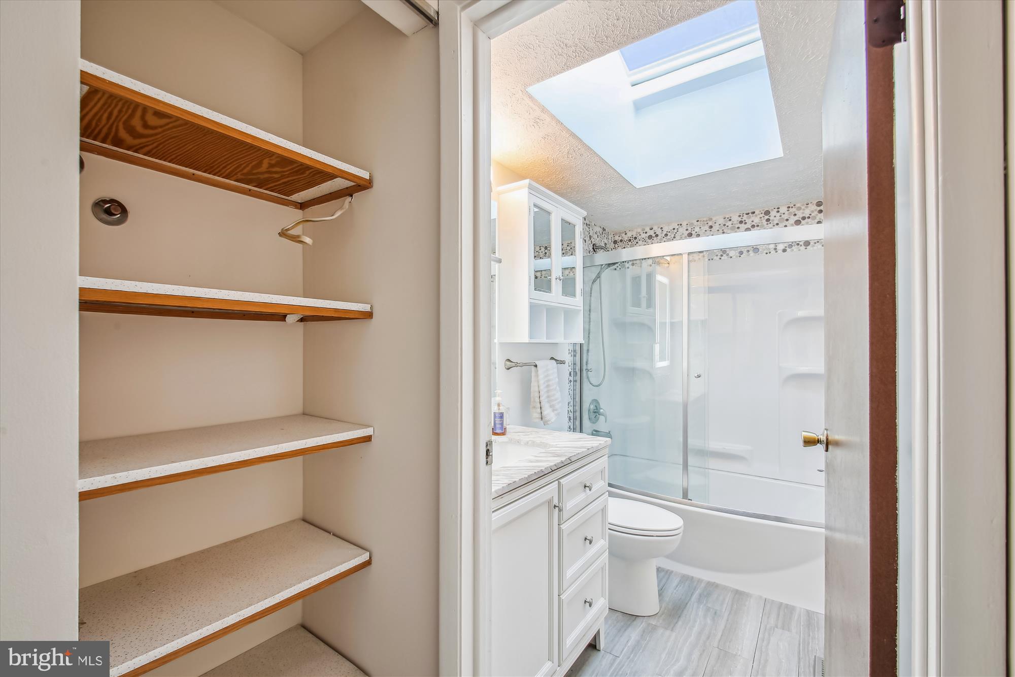 1474 Gesna Drive Hanover, MD 21076 - Photo 30 of 39 a bathroom with a toilet a sink and shower