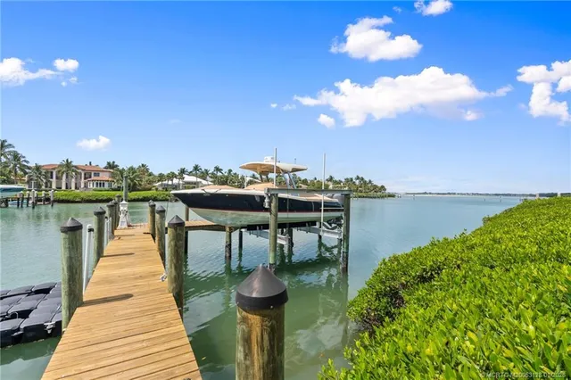 a living room with fireplace furniture and a flat screen tv