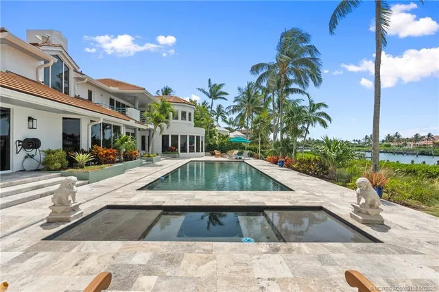 a dining room with furniture garden view and tree