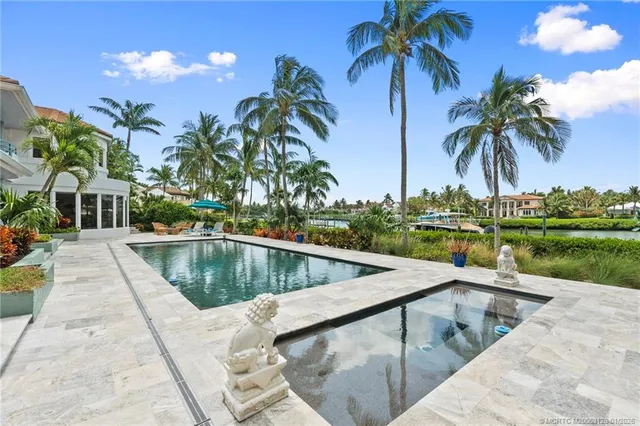 a bathroom with a sink vanity and a mirror