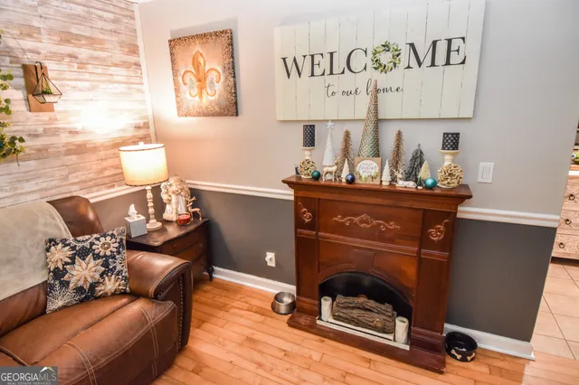 a living room with furniture and a table