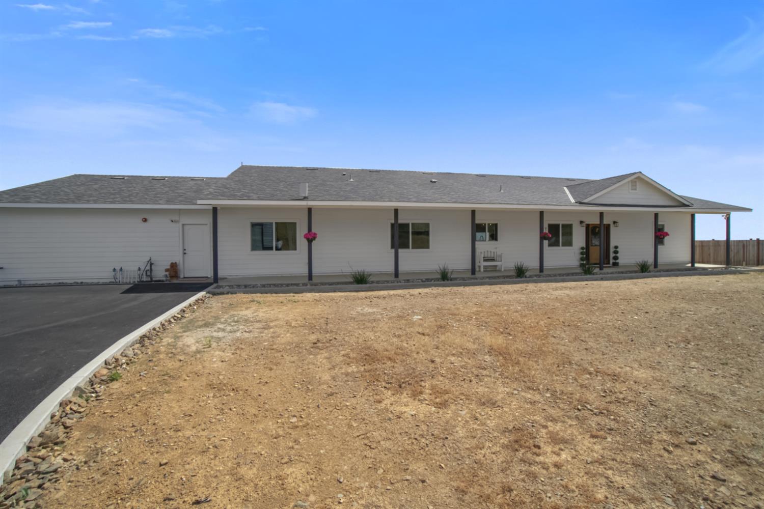 7991 South Shingle Road Shingle Springs, CA 95682 - Photo 58 of 58 a front view of a house with a yard