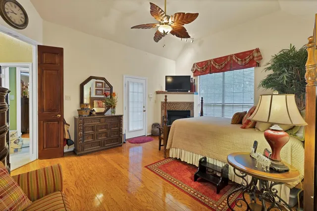 a bedroom with a bed and furniture