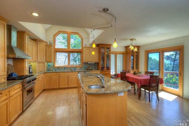 5019 Pressley Road Santa Rosa, CA 95404 - Photo 1 of 1 Gorgeous updated kitchen with designer granite slab, stainless appliances, maple w/Cherry inlay hardwood floors, loads of light and incredible views.