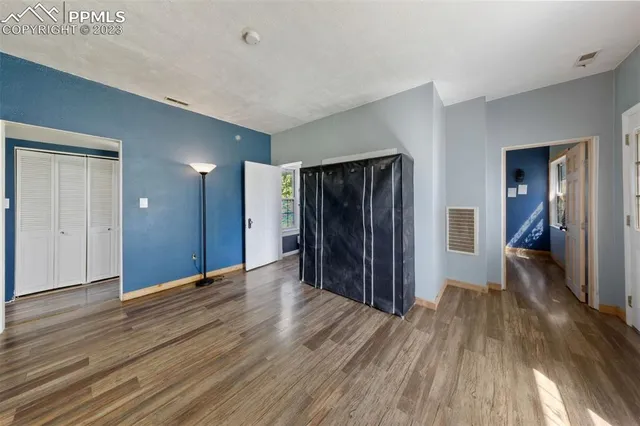 a view of a livingroom with wooden floor