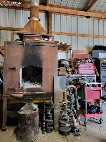 a huge green field with lots of trees