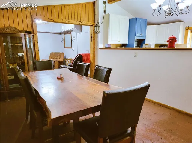 a view of a dining room with furniture