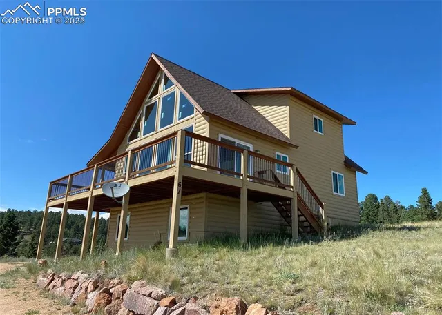 a backyard of a house with lots of green space