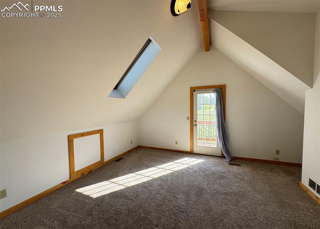 61 Muskrat Lake View Divide, CO 80814 - Photo 16 of 50 a view of an empty room with windows