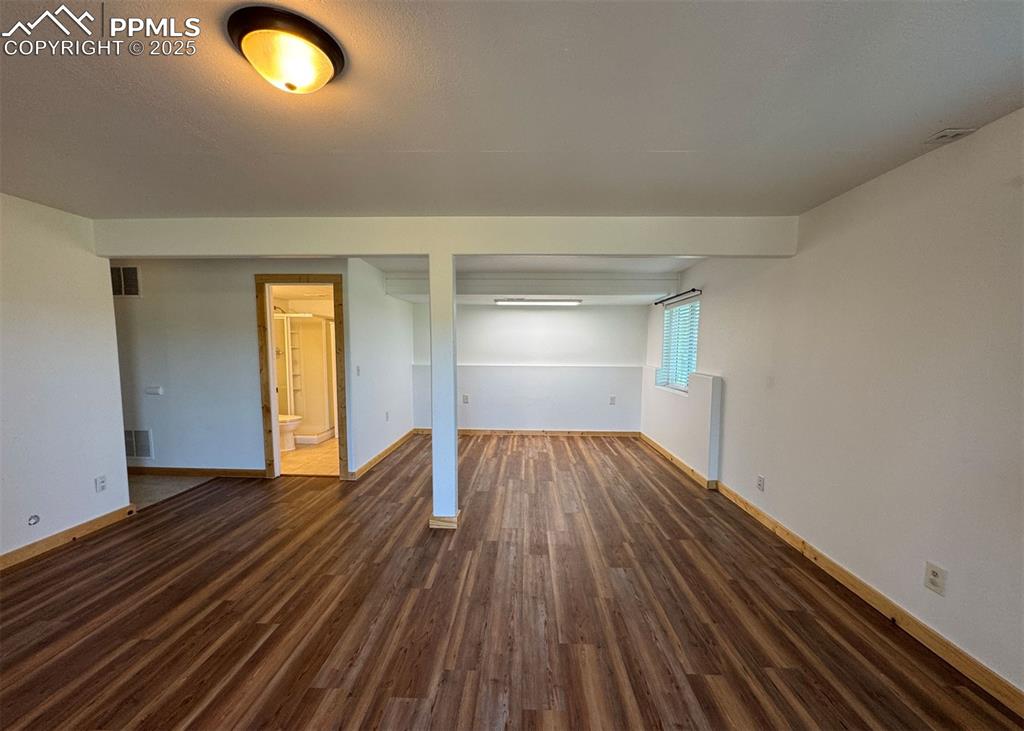 61 Muskrat Lake View Divide, CO 80814 - Photo 37 of 50 a view of empty room with wooden floor