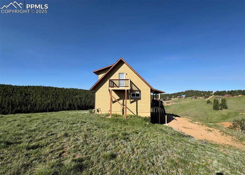61 Muskrat Lake View Divide, CO 80814 - Photo 49 of 50 a house view with a outdoor space