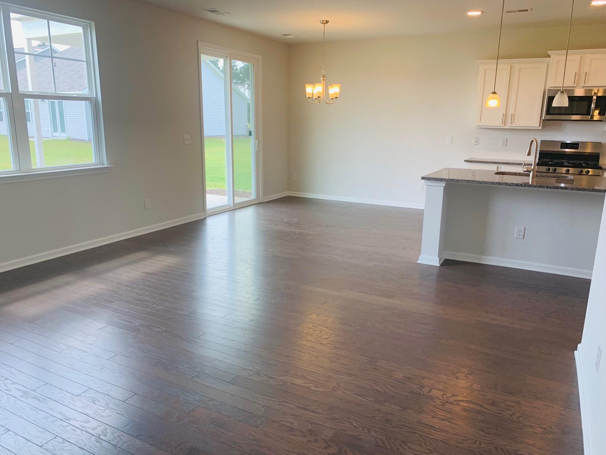 205 Rhodes Court Summerville, SC 29486 - Photo 6 of 48 Living-Dining-Kitchen