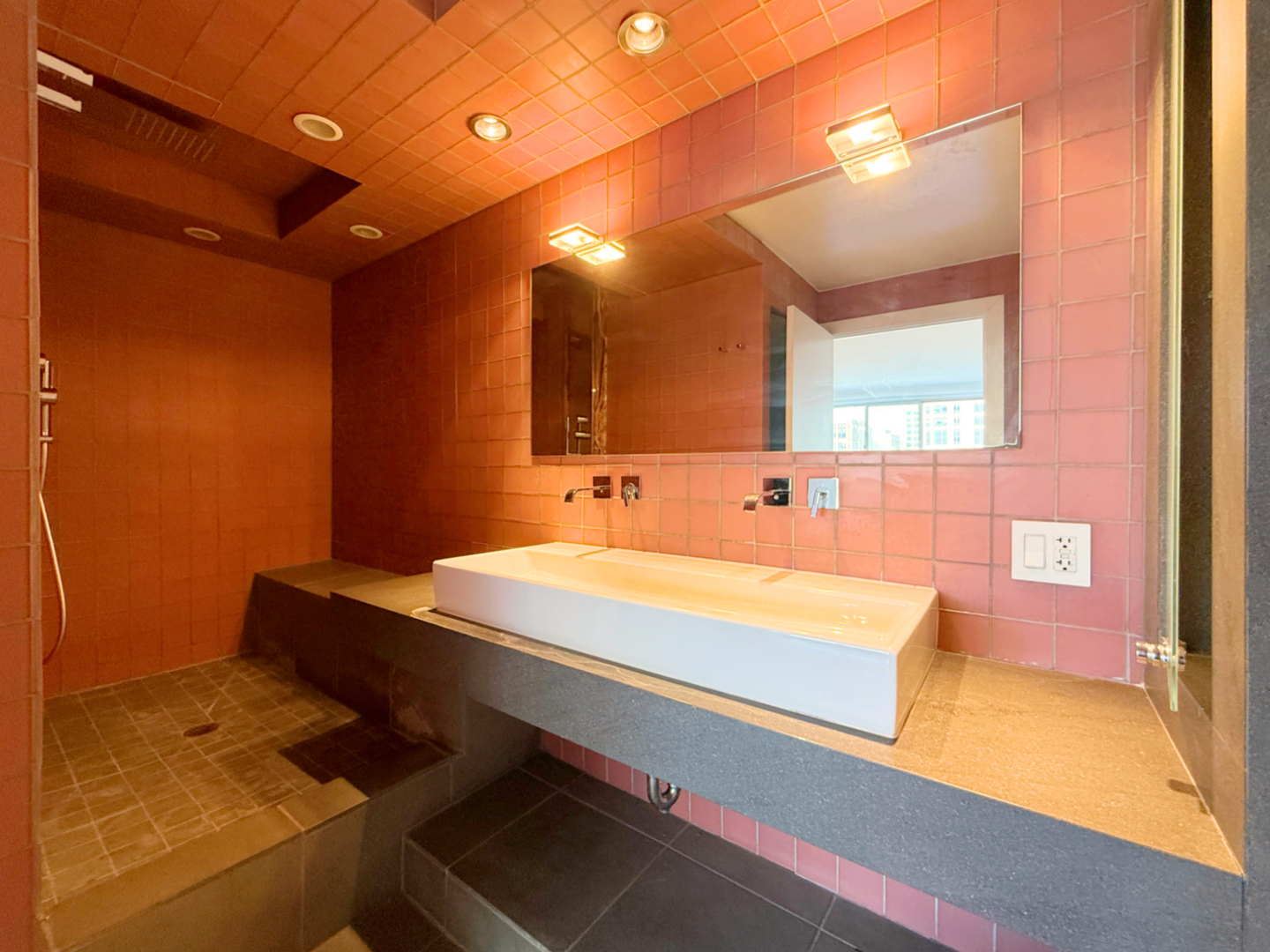 211 East Ohio Street, Unit 2707 Chicago, IL 60611 - Photo 19 of 43 a spacious bathroom with a sink and a mirror