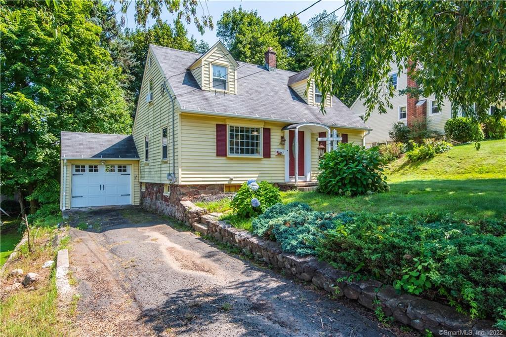 87 Willcox Street Bristol, CT 06010 - Photo 1 of 1 Front of house with attached Garage