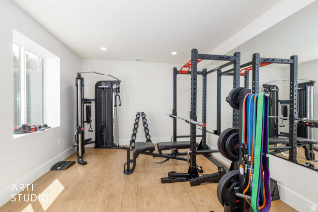 1188 South Old Trappers Loop Road Huntsville, UT 84317 - Photo 56 of 92 Dedicated fitness space featuring wood-finish flooring, recessed lighting, and a full-wall mirror