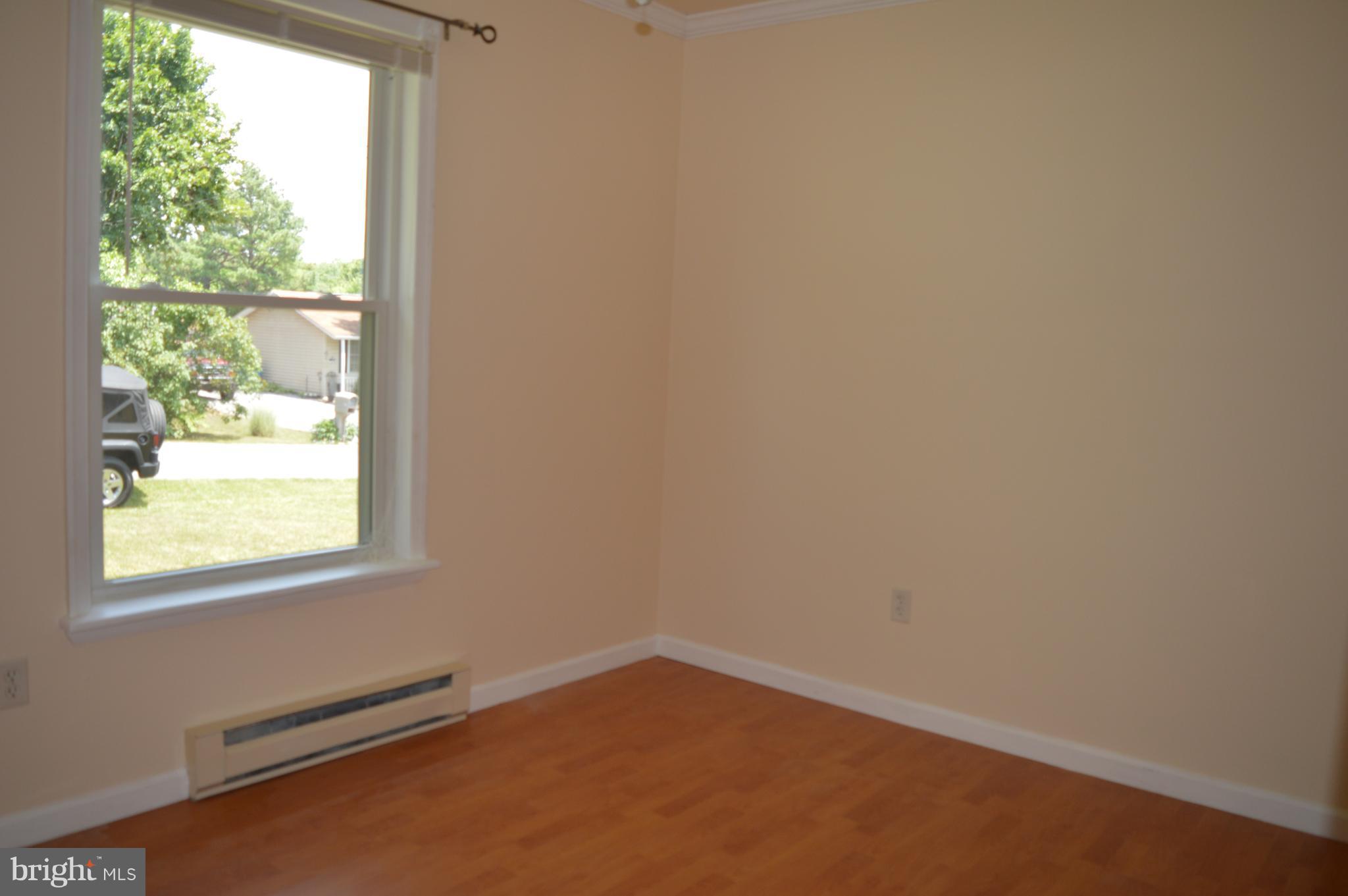 96 Harding Lane Inwood, WV 25428 - Photo 13 of 27 an empty room with a window