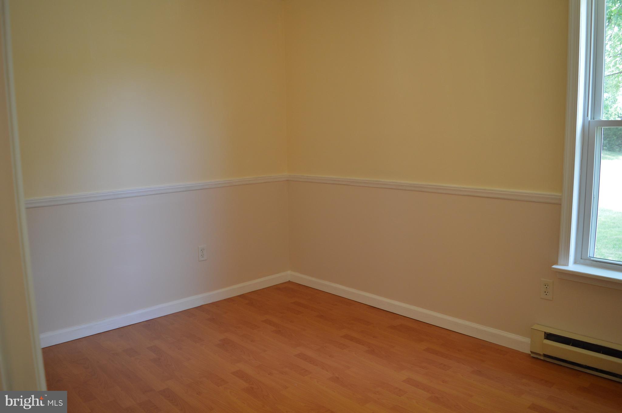 96 Harding Lane Inwood, WV 25428 - Photo 15 of 27 a view of a room with rack on the wall and a window