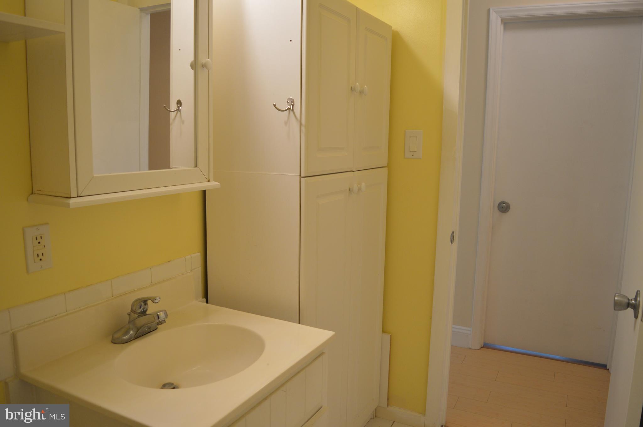 96 Harding Lane Inwood, WV 25428 - Photo 18 of 27 a bathroom with a sink and a mirror