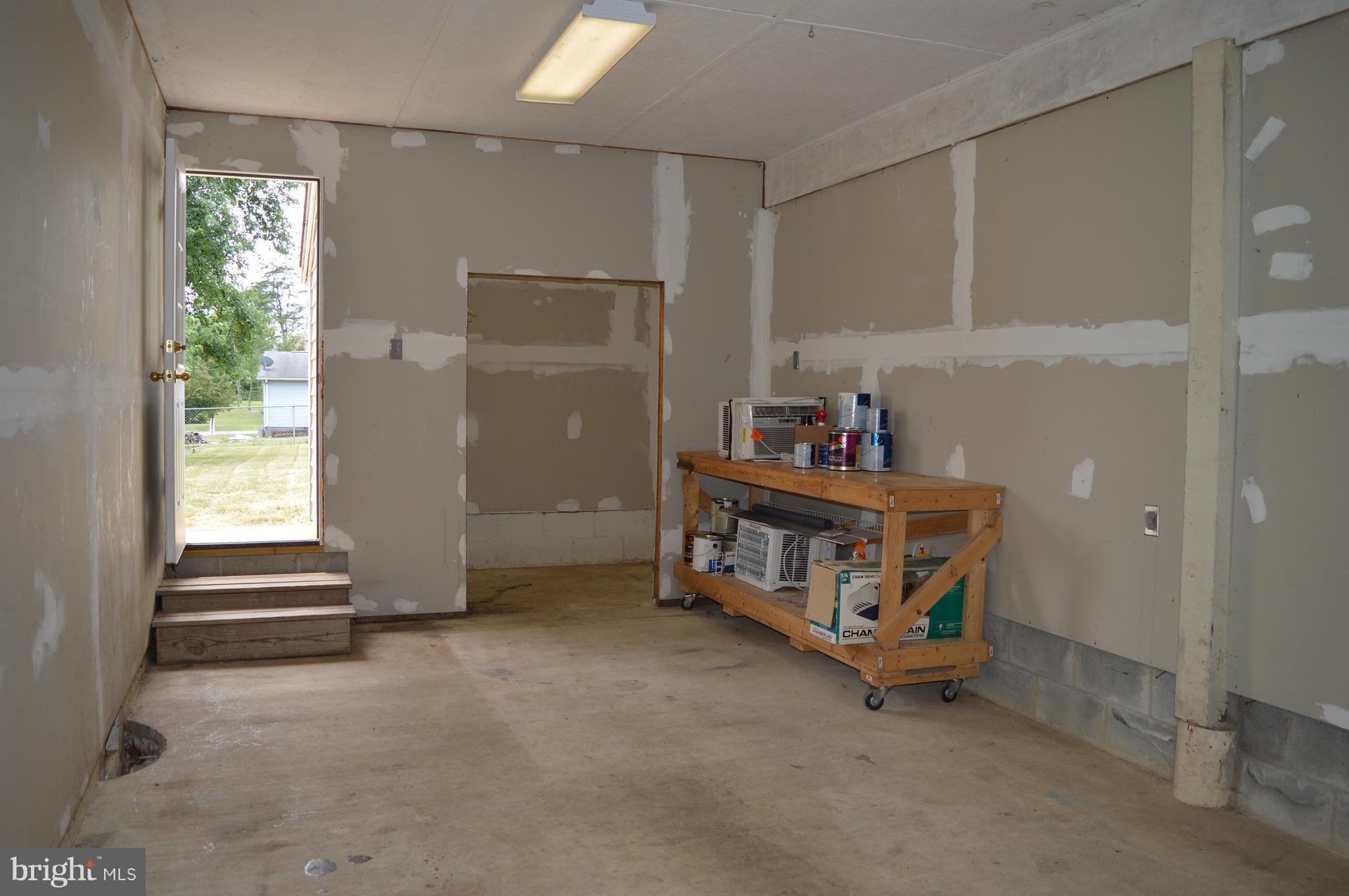 96 Harding Lane Inwood, WV 25428 - Photo 20 of 27 a room with toys and a table