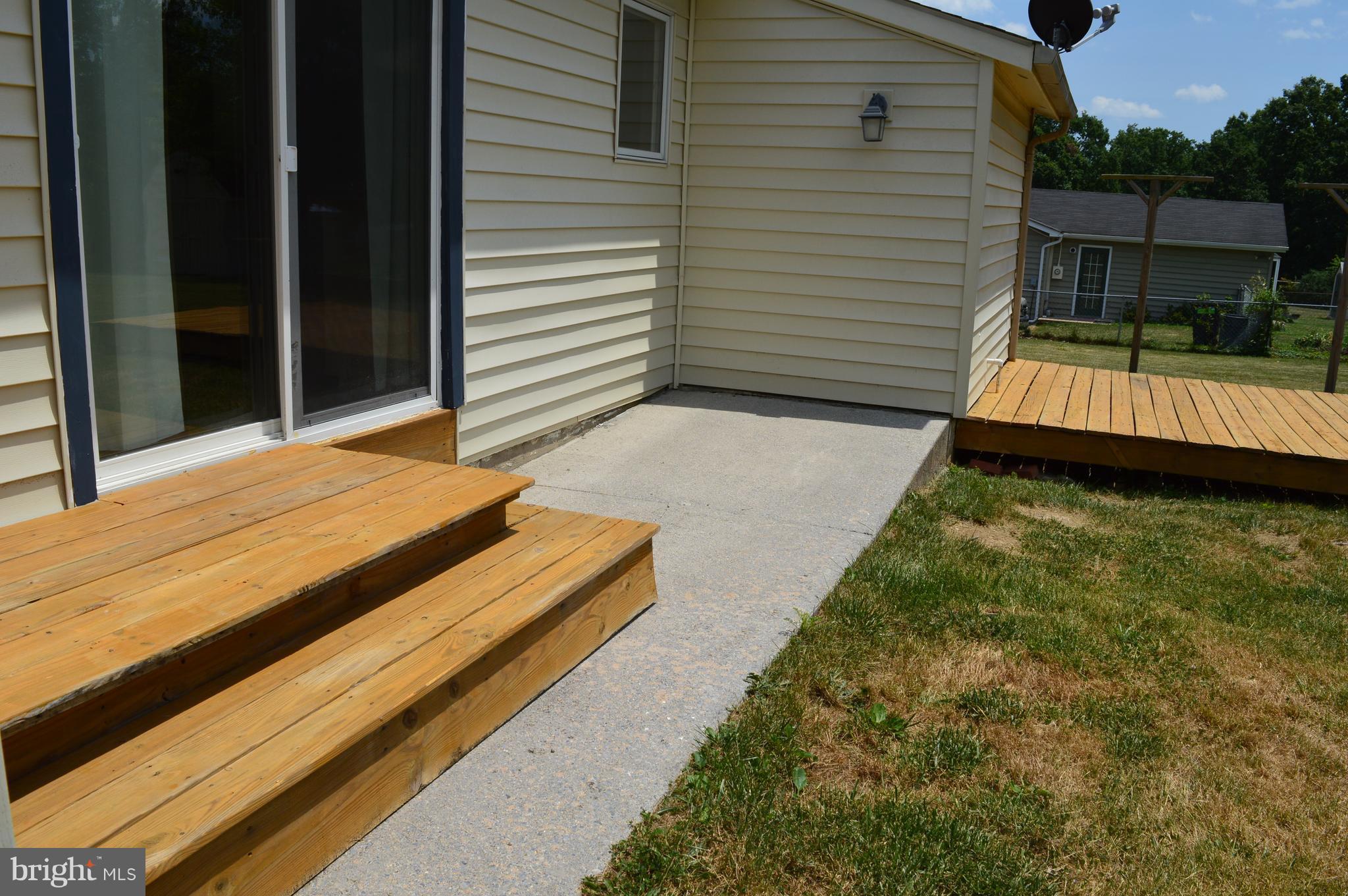 96 Harding Lane Inwood, WV 25428 - Photo 26 of 27 a balcony with view of the house
