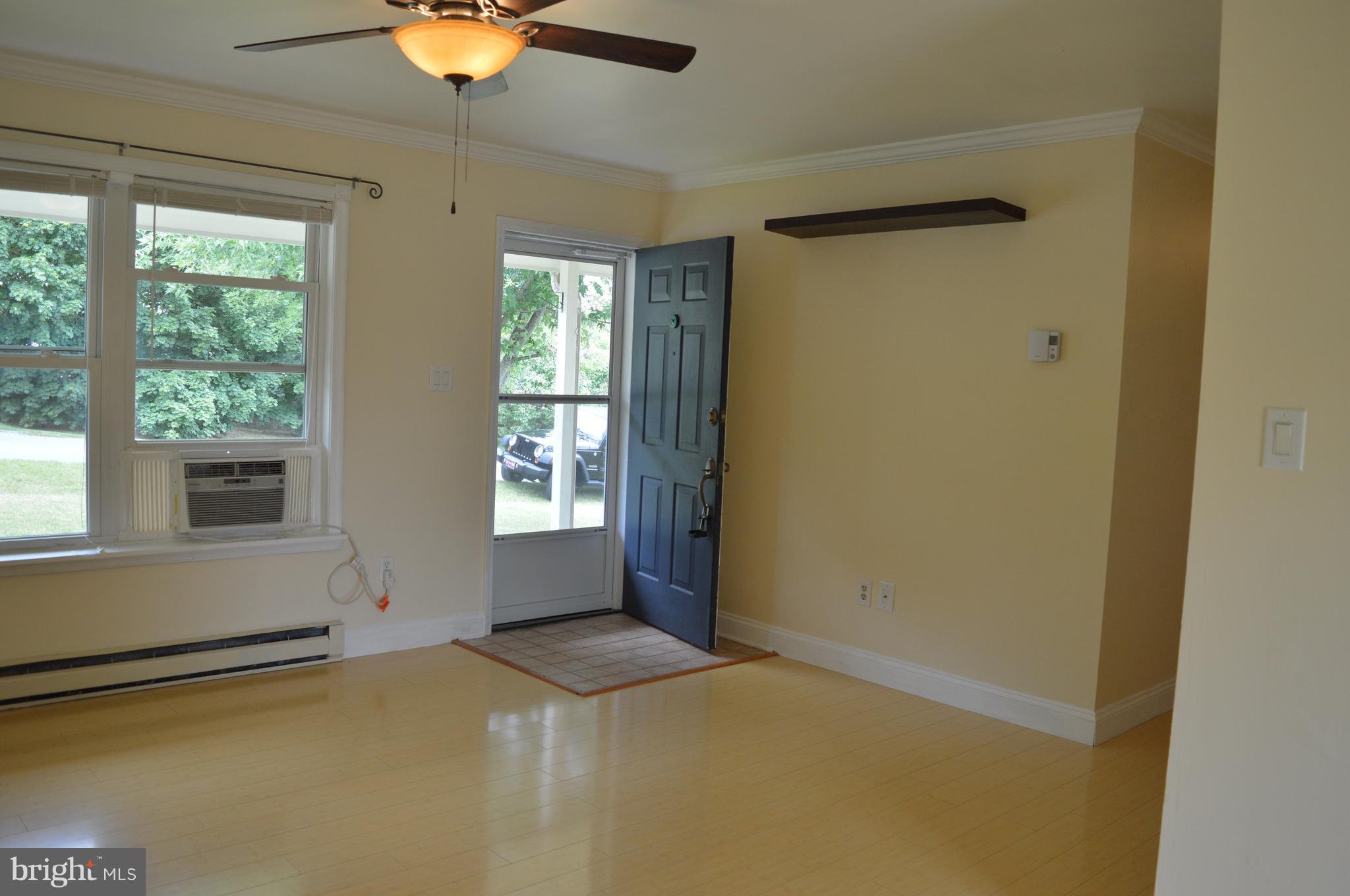 96 Harding Lane Inwood, WV 25428 - Photo 4 of 27 an empty room with a window