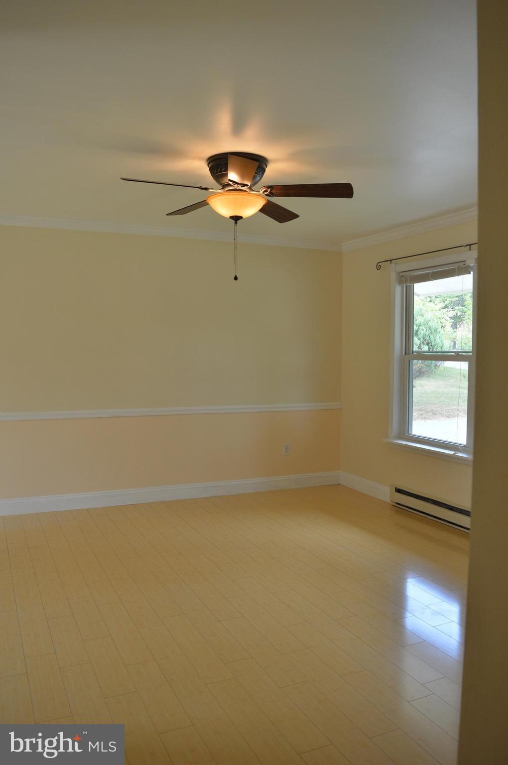 96 Harding Lane Inwood, WV 25428 - Photo 5 of 27 a view of room with a window and a ceiling fan