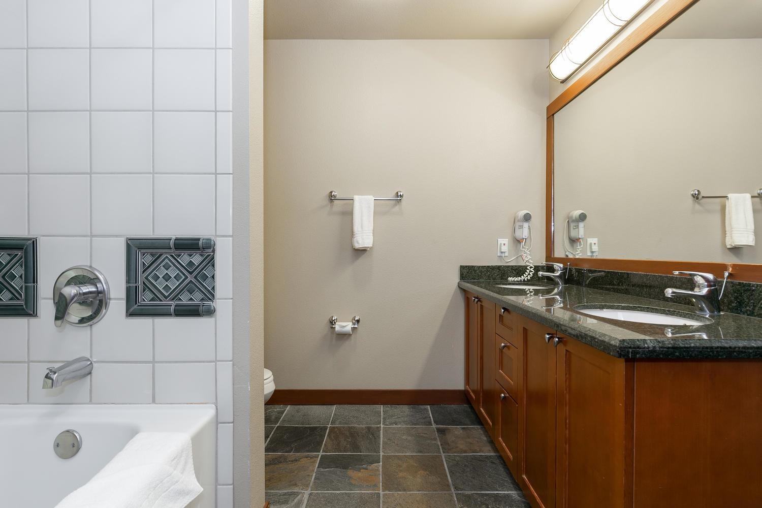 1750 Village East Road, Unit 5306 Olympic Valley, CA 96146 - Photo 12 of 21 a bathroom with a sink and a mirror