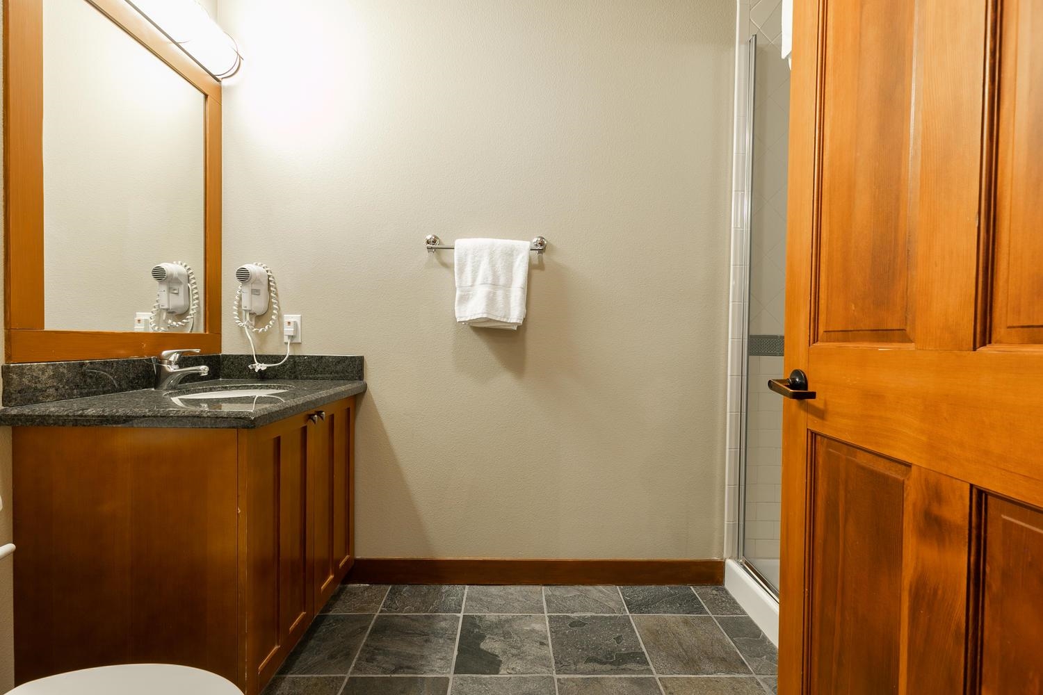 1750 Village East Road, Unit 5306 Olympic Valley, CA 96146 - Photo 16 of 21 a bathroom with a sink and a mirror