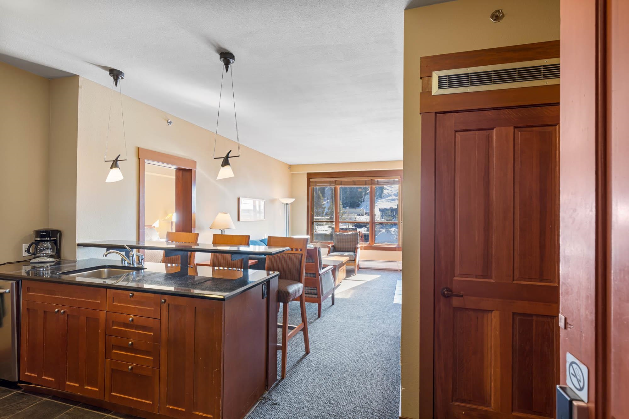 1750 Village East Road, Unit 5306 Olympic Valley, CA 96146 - Photo 6 of 21 a room with lots of wooden furniture