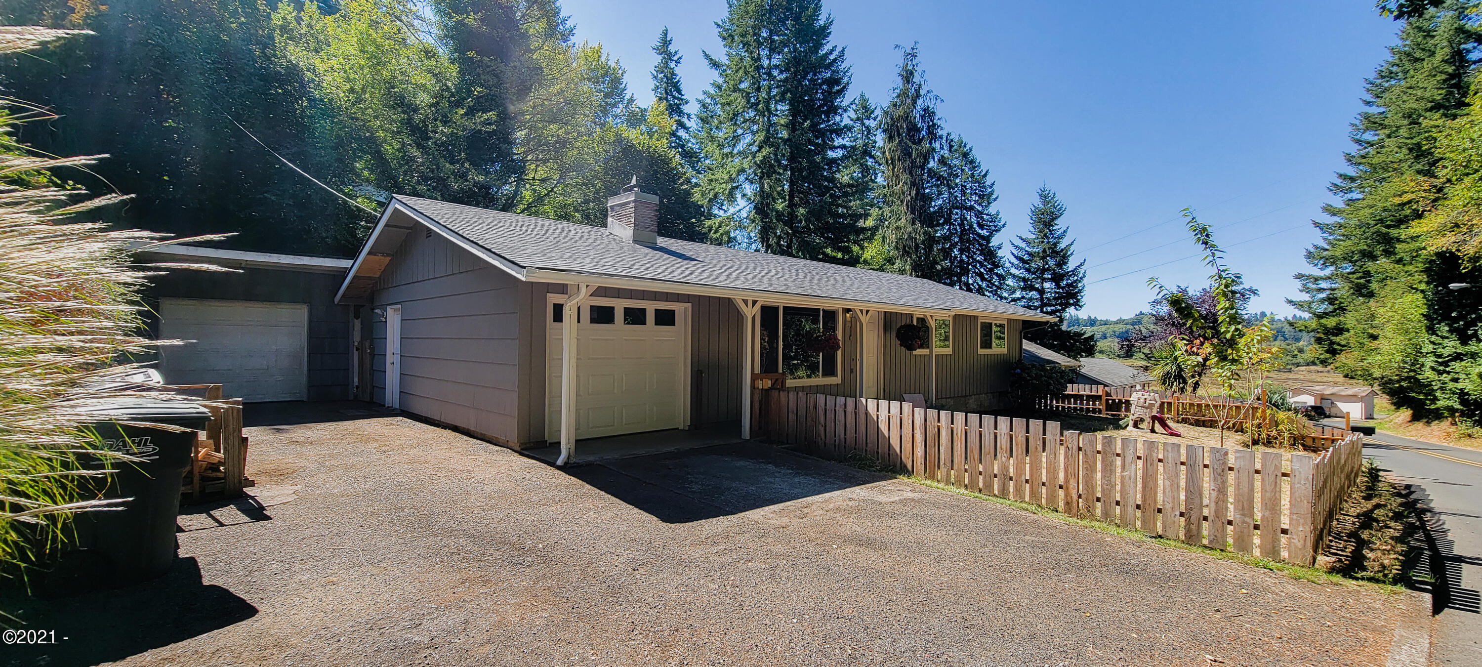 1449 Southeast Ammon Road Toledo, OR 97391 - Photo 3 of 32 Driveway, Garage, and Shop.