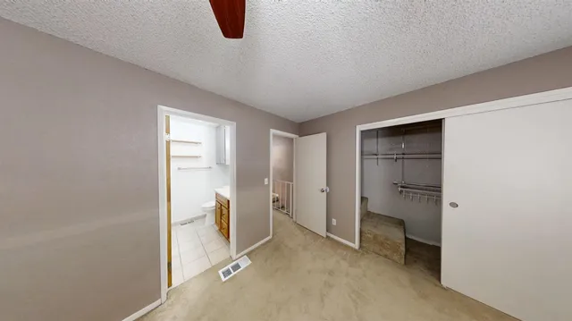 a view of walk in closet with window