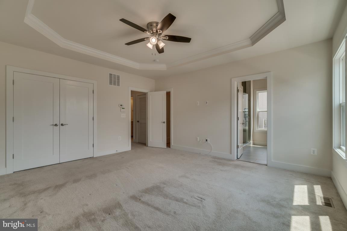 44721 Ellsworth Terrace Ashburn, VA 20147 - Photo 18 of 51 an empty room with chandelier fan