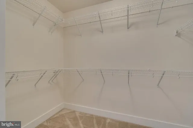 a view of a room with racks on the wall