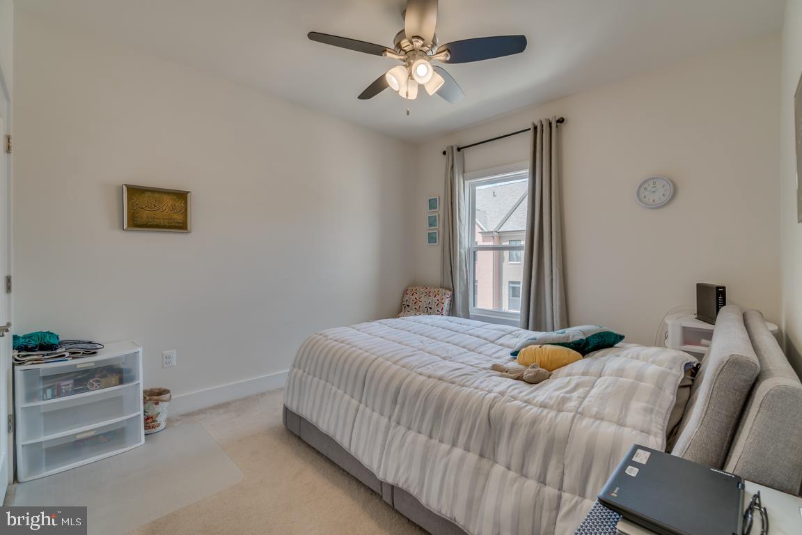 44721 Ellsworth Terrace Ashburn, VA 20147 - Photo 28 of 51 a bedroom with a bed and a window