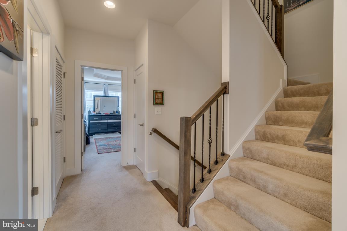 44721 Ellsworth Terrace Ashburn, VA 20147 - Photo 30 of 51 a view of a hallway with staircase