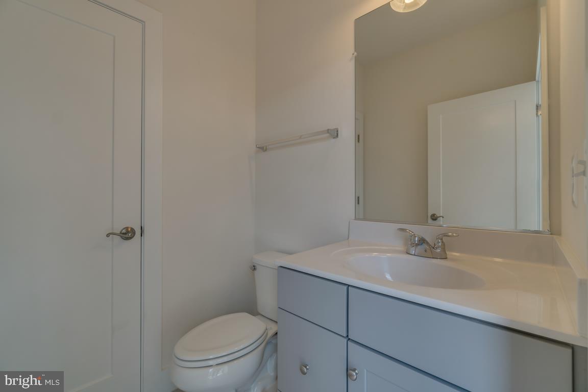 44721 Ellsworth Terrace Ashburn, VA 20147 - Photo 35 of 51 a bathroom with a sink toilet and vanity
