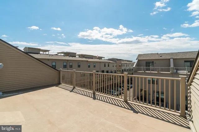 a view of a building with sitting area