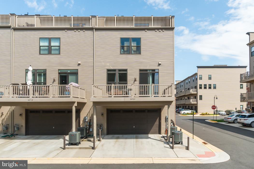 44721 Ellsworth Terrace Ashburn, VA 20147 - Photo 39 of 51 a view of a building with sitting area