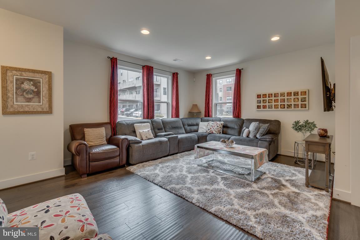 44721 Ellsworth Terrace Ashburn, VA 20147 - Photo 6 of 51 a living room with furniture window and wooden floor