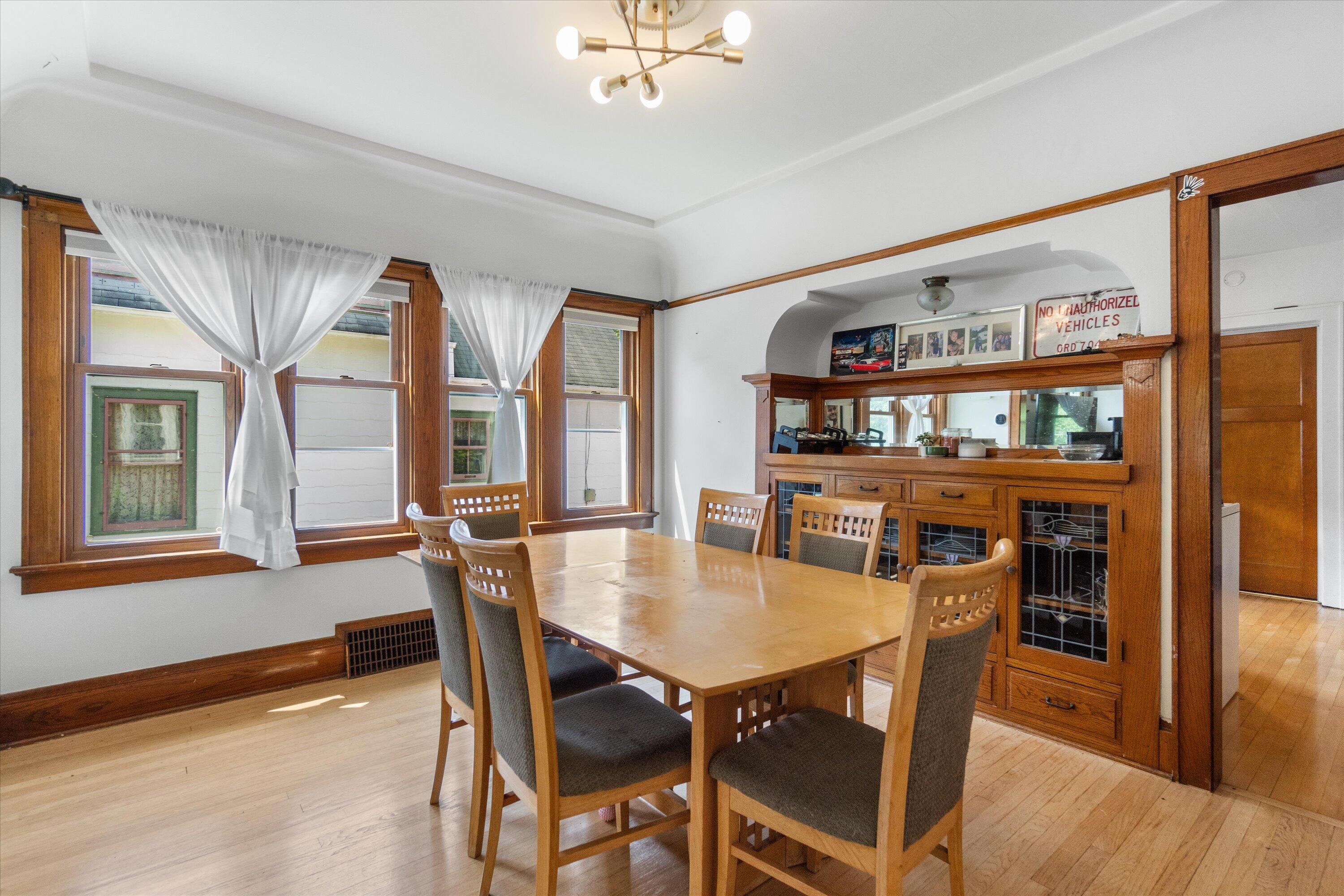 159 North 59th Street Milwaukee, WI 53213 - Photo 27 of 34 Elegant dining space with classic woodwork and oversized windows