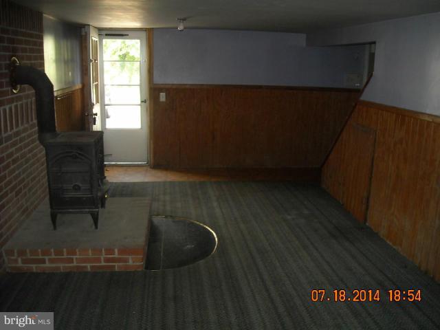 7338 Montgomery Road Elkridge, MD 21075 - Photo 5 of 8 a view of water heater room