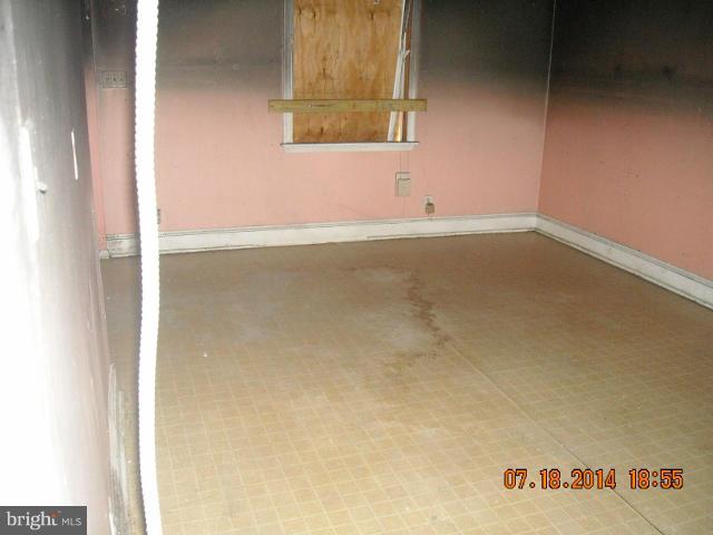 7338 Montgomery Road Elkridge, MD 21075 - Photo 7 of 8 an empty room with a window