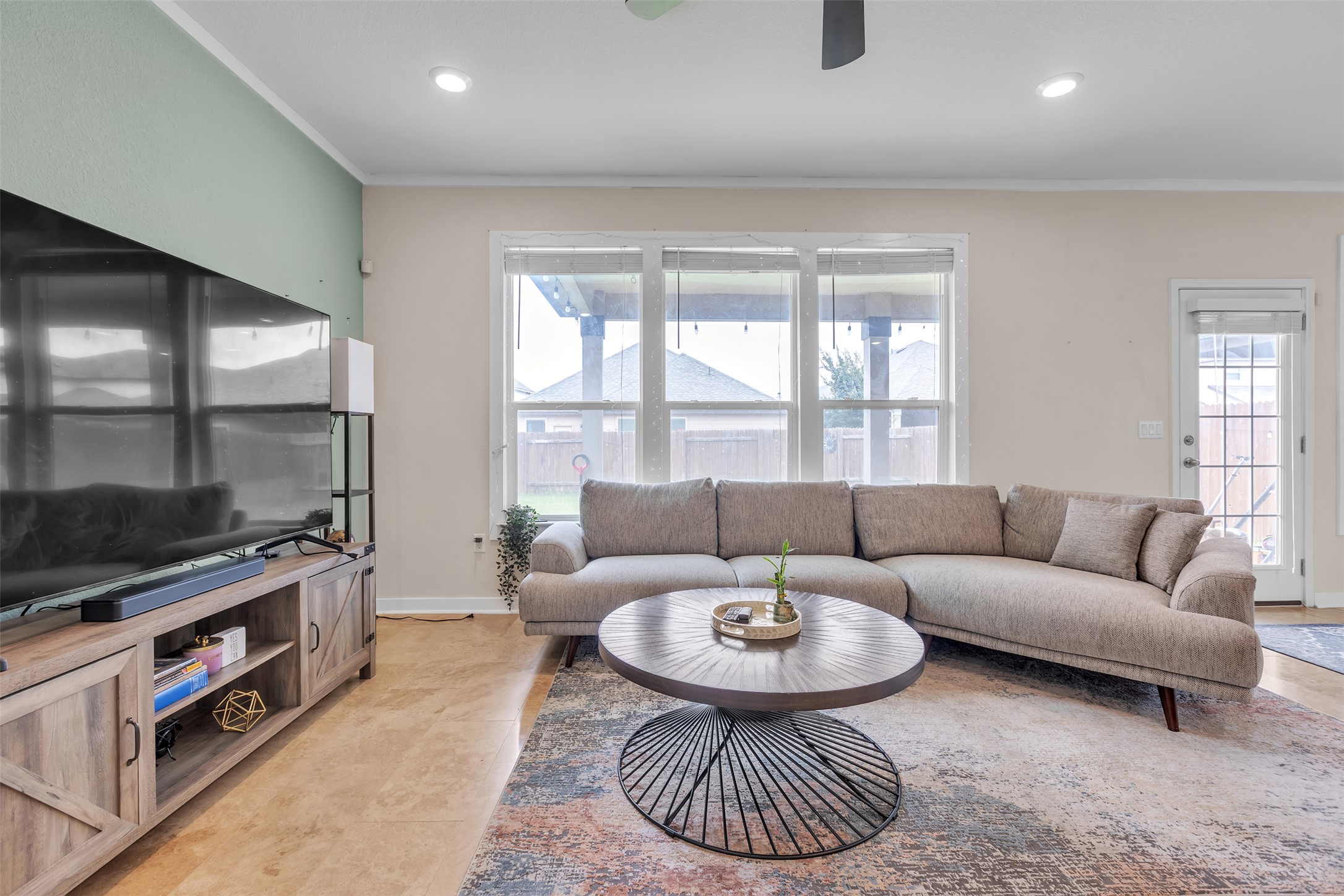 128 Kavanaugh Street Georgetown, TX 78628 - Photo 6 of 13 Living area featuring wood-finish flooring, recessed lighting, and a ceiling fan